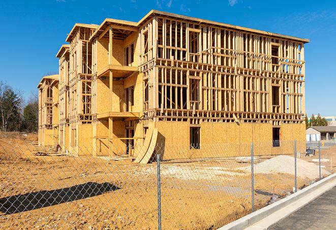 a close-up of temporary chain link fences enclosing a construction site, signaling progress in the project's development in Campo CA